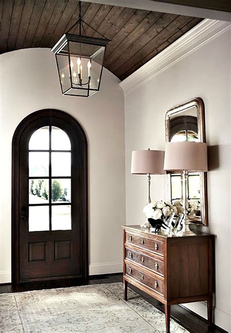 10 gorgeous entryway ideas for your home from traditional to modern and farmhouse. The entrance foyer with arched ceiling mirrors the shape ...