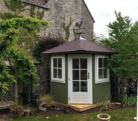 Small Corner Summerhouse Painted With Double Glazed Door And Windows And