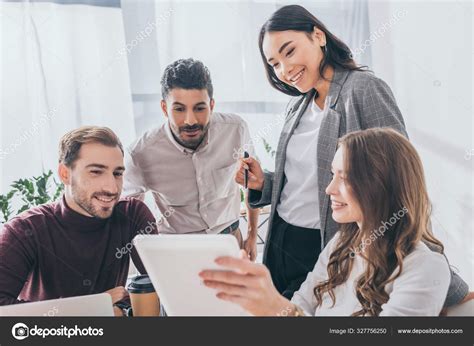 Cheerful Multicultural Coworkers Looking Digital Tablet Office — Stock