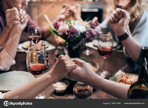 People Praying Before Dinner — Stock Photo © Tarasmalyarevich 166311898