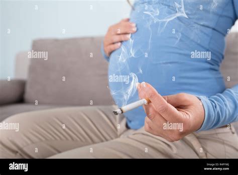 Pregnant Women Smoking Cigarette Stock Photo Alamy