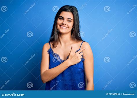 Young Beautiful Brunette Woman Wearing Elegant And Comfortable Blue