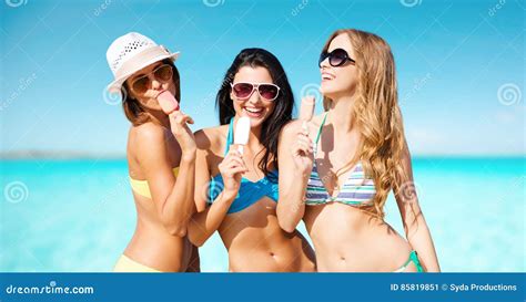 Group Of Smiling Women Eating Ice Cream On Beach Stock Image Image Of