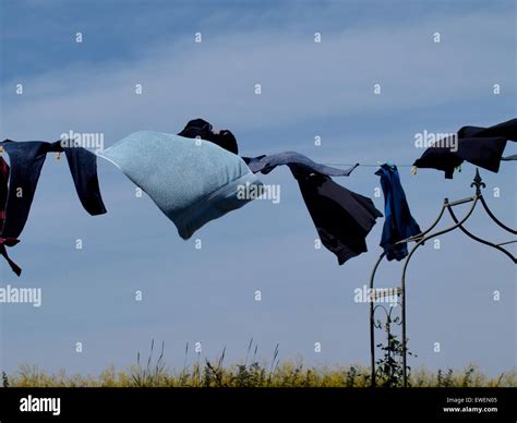 Washing On A Line Blowing In The Wind Somerset Uk Stock Photo Alamy