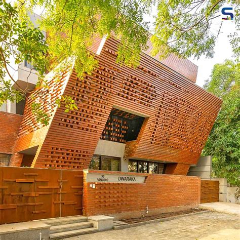 A Rustic Yet Futuristic Parametric Brick Facade Wraps This Residential