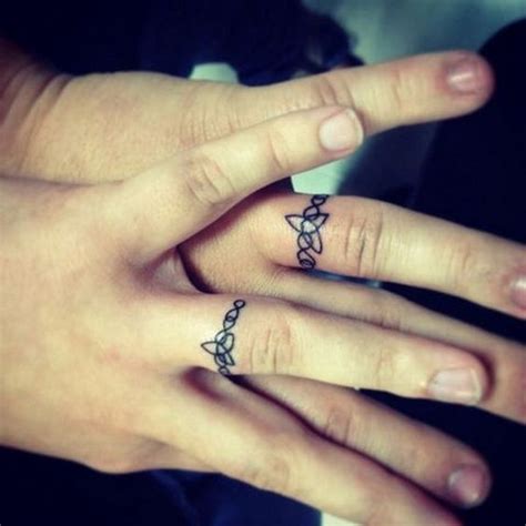 40 Sweet And Meaningful Wedding Ring Tattoos Styletic