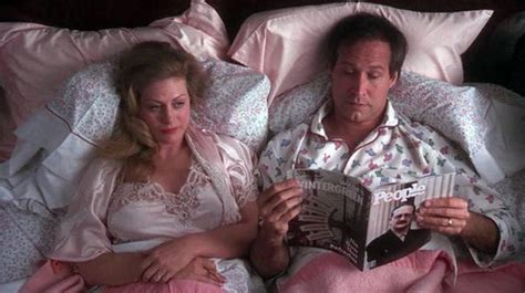 In National Lampoons Christmas Vacation 1989 Clark Chevy Chase Is Reading A People