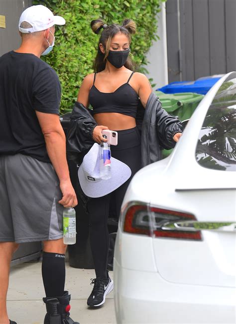 ariana grande shows off her toned abs and pokies after an intense workout in la 10 photos