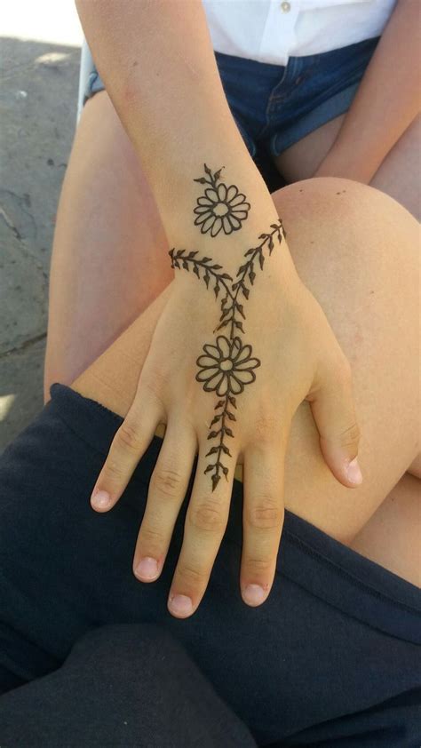 Simple Hand Henna Tattoos