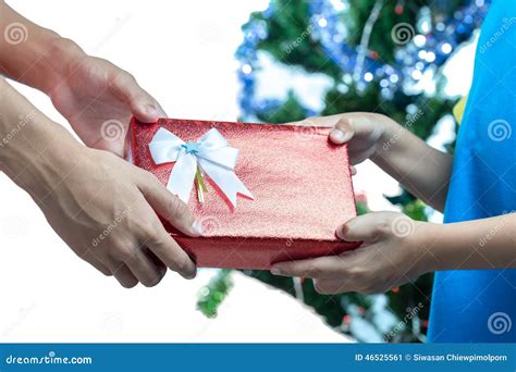 Hands Giving And Receiving A Present Stock Image Image Of Surprise