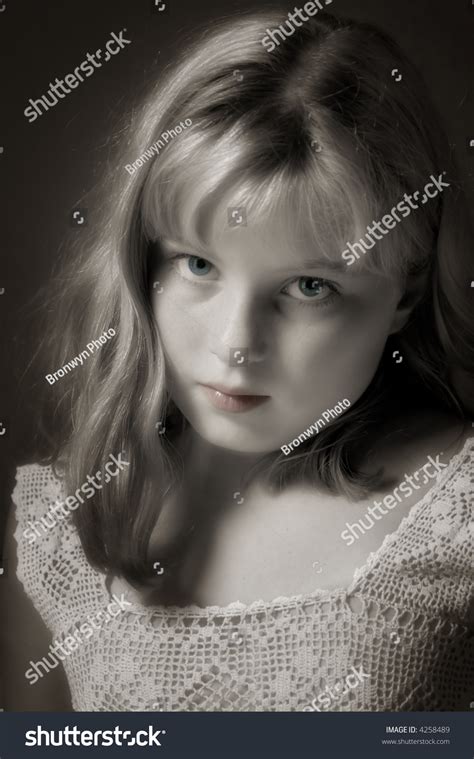 Lovely Preteen Girl Showing Budding Maturity Foto Stock 4258489