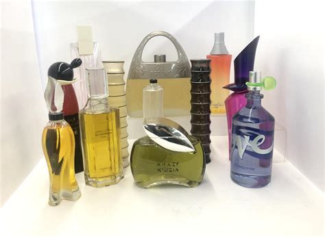 A Collection Of Twelve Perfume Factice Bottles