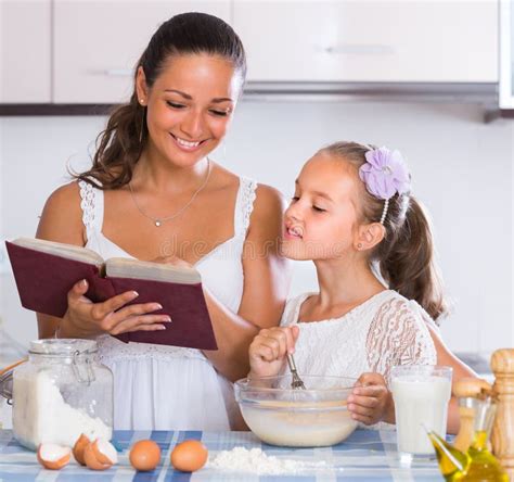 Happy Girl Helping Mother At Kitchen Stock Photo Image Of Learning
