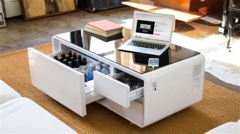 Set the mood or start the party with rich deep sound. http://High-tech Coffee Table Hides A Beer Fridge And A ...