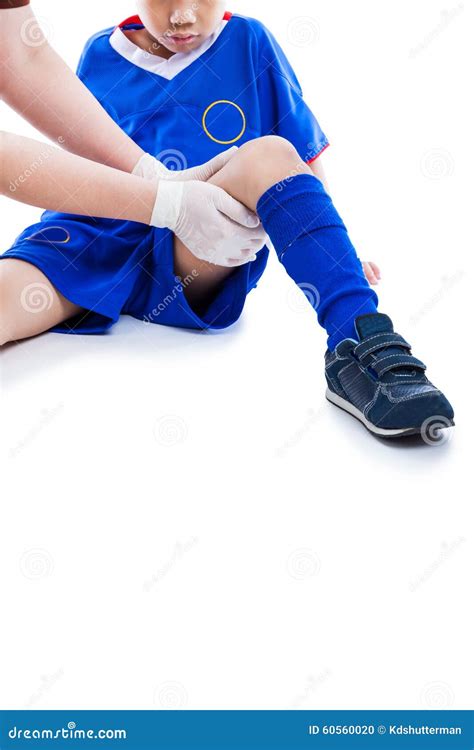 Sports Injury Doctor First Aid At Thigh Of Soccer Player Isola Stock