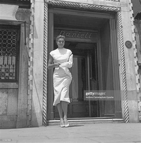 American Actress Esther Williams Wearing A Dress And Sunglasses