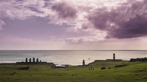 Silhouettes Of Ahu Tahai Moai In Hanga Roa Easter Island During Sunset