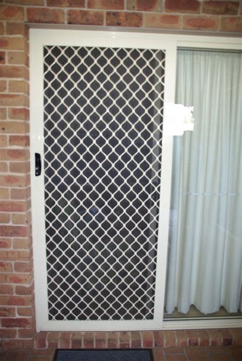 White steel sliding patio screen door with 77 reviews. Sliding Door Screen Protectors | Sliding screen doors ...