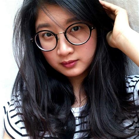 asian girl with glasses scrolller