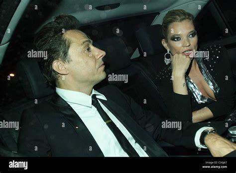 jamie hince and kate moss arriving at simon cowell s 50th birthday party in north london london