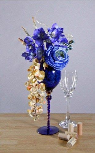 Hand Arranged Blue And Cream Floral Arrangement In Blue Wine Glass Rachels Hear Small
