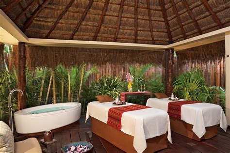 an outdoor couples massage is a great way to reconnect with your partner at dreams riviera