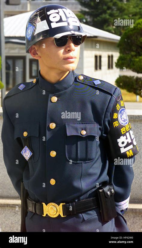 A Republic Of Korea Rok Military Police Mp Stands Guard Duty At