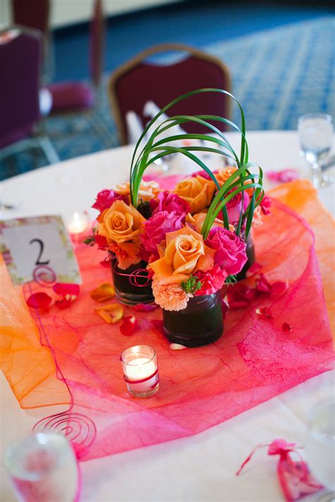 Small Centerpieces Orange And Pink Roses And Carnations Love The