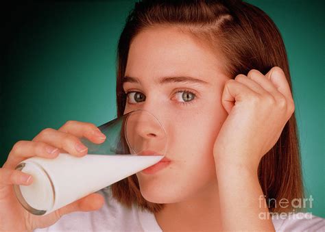 Woman Drinking Glass Of Milk Photograph By Oscar Burriel Science Photo