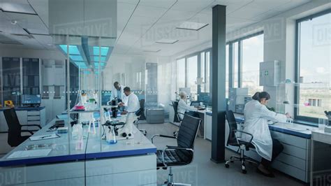 Modern Medical Research Laboratory Team Of Scientists Working With