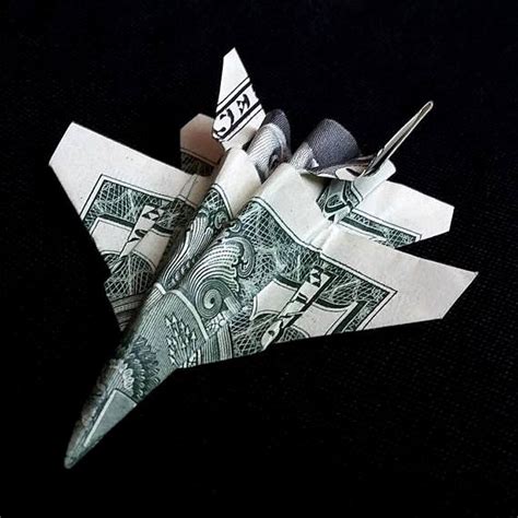 Folded Dollar Bill Airplane Origami