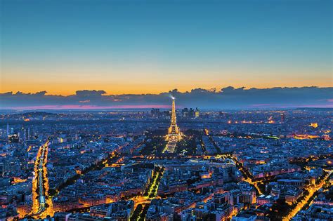 Eiffel Tower And Paris Skyline At Night Photograph By Pawel Libera