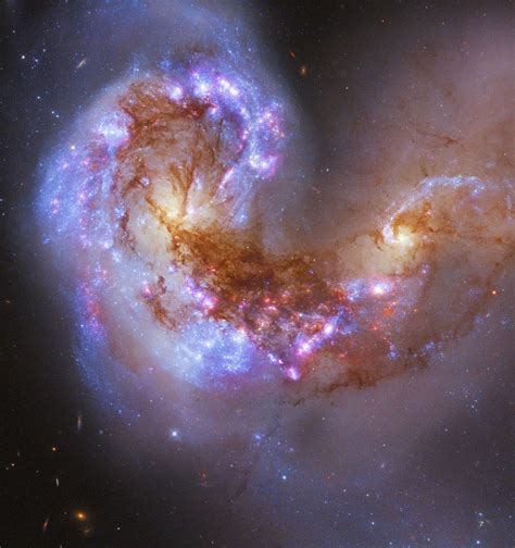 The Antennae Galaxies Two Spiral Galaxies Merging To Become One