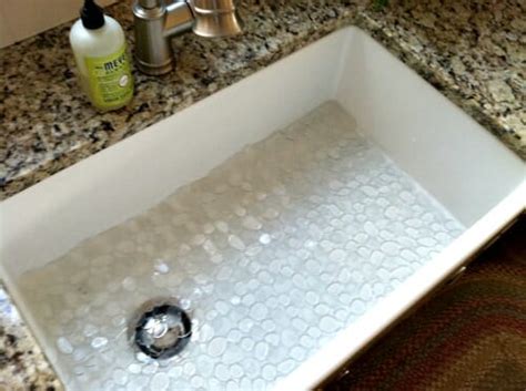 Due to the light and screen difference, the. How to Clean a Porcelain Farmhouse Kitchen Sink | Andrea ...