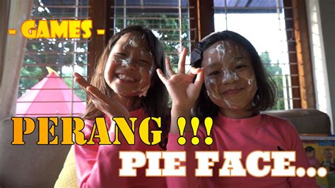 She wears a purple turtleneck with a dark blazer while being pelted with pies. FUN GAME PIE FACE CHALLENGE!!! -Ter - Rusuh - Messy Whipped Cream in the FACE Game - YouTube