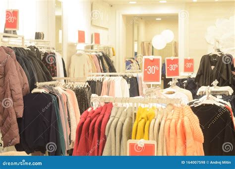 Sale Of Clothes With 30 Percent Discount In The Store Or Shopping