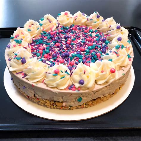 Birthday Cake Cheesecake With Cookie Crust And Cake Batter Buttercream