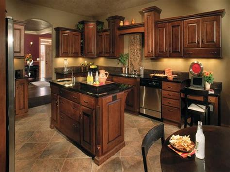 Select paint colors that aesthetically unite the color of your cabinets with accessories, window treatments, hardware, appliances and kitchen furniture. Kitchen Paint Colors with Dark Cabinets | Brown kitchen ...