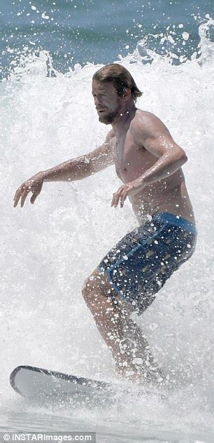 Simon Baker Spotted Gliding Across A Christmas Day Wave At Bondi