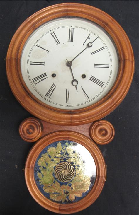 Bid Now Antique E Ingraham Ionic Figure 8 Wall Clock 22 X 13