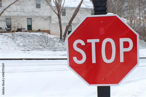 Stop Sign On Icy Road Stock Photo Adobe Stock