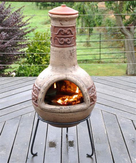 Steel outdoor wood burning chiminea fire pit with log poker grate and cover Clay Fire Pits Chimineas | Fire Pit Design Ideas