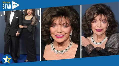 Joan Collins Puts On Loved Up Display With Husband Perc At Film Event