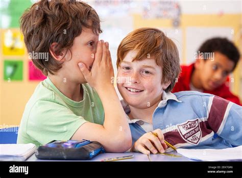 School Children Talking In A Classroom Stock Photo Alamy