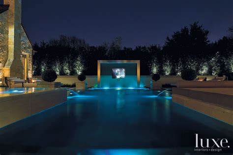 Contemporary Pool Area With Waterfall Projection Screen Luxe