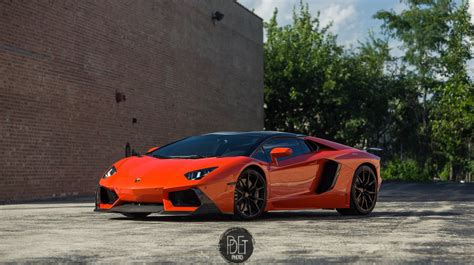 ravishing red lamborghini aventador grabs attention with carbon fiber parts — gallery