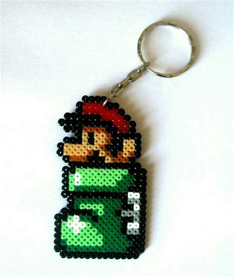 A Keychain Made To Look Like An Old Video Game Character