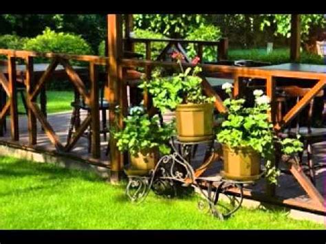 From anna at ' home, heart and hands ', make this diy porch planter with gold dipped legs, for $8! DIY Patio decorations ideas on a budget - YouTube