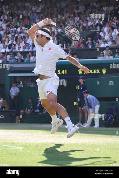 Low Angle View Of Swiss Tennis Player Roger Federer Jumping In The Air