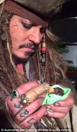 Johnny Depp Bottle Feeds A Tiny Orphan Bat Named Jackie Sparrow